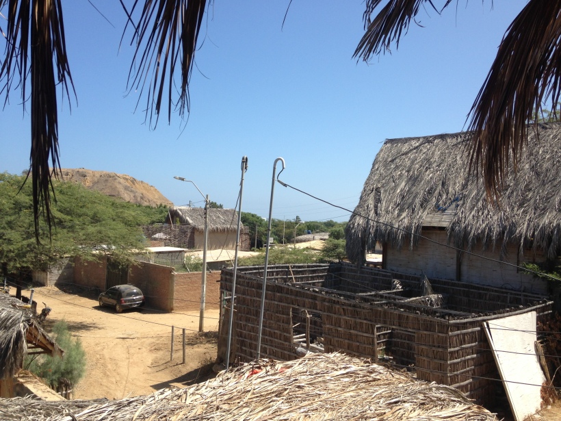 Past those thatched roofs= the beach. Yeah